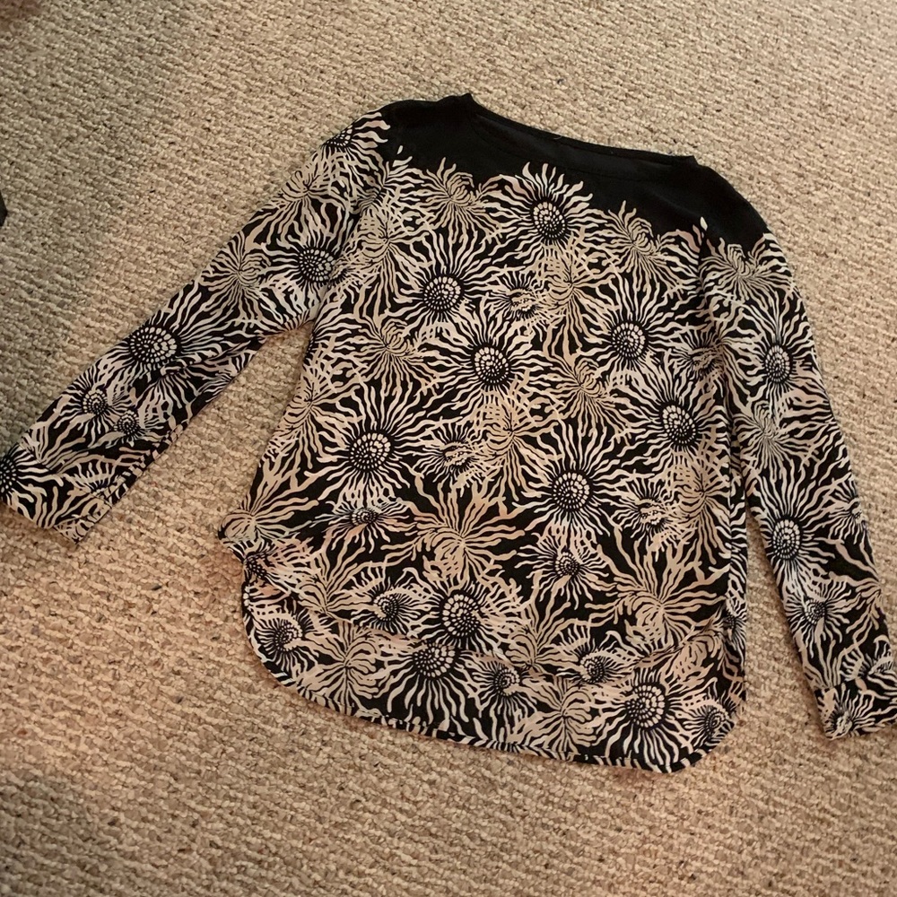Slightly sheer floral black blouse